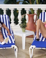 St John lesbians Brea Bennett and Nella in white and pink micro bikinis having fun by the pool