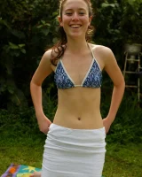 Hot hairy pussy Annabel in bikini in her garden is cooled