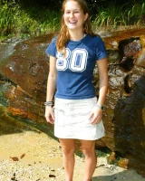 Bron takes off the skirt to appear in bikini and to be naked in the cold river to have her nipples puffy