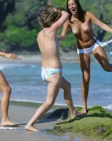 Lazuli, Seriya and Joan playing in the lake in bikinis