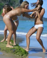 Lazuli, Seriya and Joan playing in the lake in bikinis
