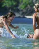 Lazuli, Seriya and Joan playing in the lake in bikinis
