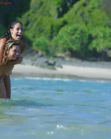 Lazuli, Seriya and Joan playing in the lake in bikinis