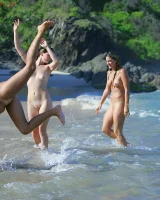 Lazuli, Seriya and Joan playing in the lake in bikinis