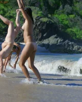 Lazuli, Seriya and Joan playing in the lake in bikinis