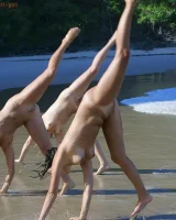 Lazuli, Seriya and Joan playing in the lake in bikinis
