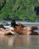 Lazuli, Seriya and Joan playing in the lake in bikinis