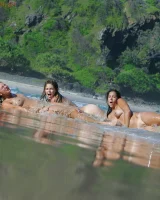 Lazuli, Seriya and Joan playing in the lake in bikinis