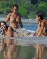 Lazuli, Seriya and Joan playing in the lake in bikinis