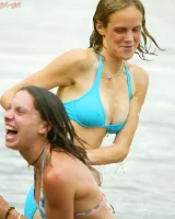 Hairy pussies Lizzie, Morgana and Collette playing on the beach in bikinis and nude in the water