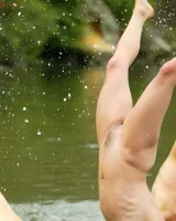 Hairy pussies Lizzie, Morgana and Collette playing on the beach in bikinis and nude in the water