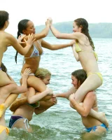 Six nudist girls playing games