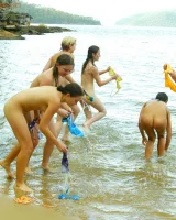 Six nudist girls playing games