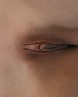 Nice girl Rena removes her bikini for nude poses while boating on a lake