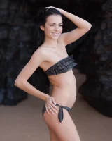 Puffy nipples brunette teen Sapphira in black bikini gets naked on hidden beach