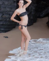 Puffy nipples brunette teen Sapphira in black bikini gets naked on hidden beach