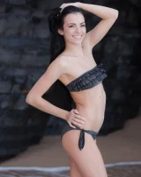 Puffy nipples brunette teen Sapphira in black bikini gets naked on hidden beach