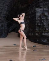 Puffy nipples brunette teen Sapphira in black bikini gets naked on hidden beach