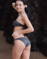 Puffy nipples brunette teen Sapphira in black bikini gets naked on hidden beach