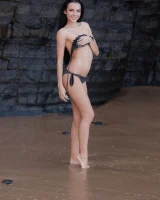 Puffy nipples brunette teen Sapphira in black bikini gets naked on hidden beach