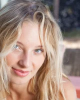 Sexy blonde Sarah showcases her shaved pussy after bikini removal on the patio