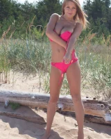 Big boobs Vanea appears in pink bikini and nude on the beach