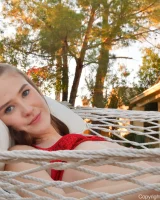 Sexy brunette Athena in red bikini