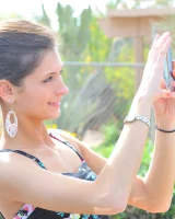 Remarkable Jody in tight black top and pink shorts visits pool in sexy motley bikini