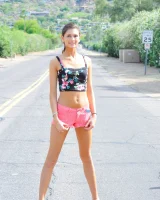 Remarkable Jody in tight black top and pink shorts visits pool in sexy motley bikini