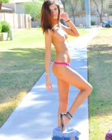 Slim sexy body Jody in tight jeans shorts and pink bikini is going fully nude outdoor at the canal