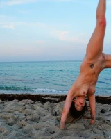 Puffy nipples Leah in sexy pink and yellow bikini and nude on the beach