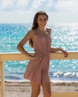 Delicious teen Mackenzie strips naked and poses shamelessly on the beach