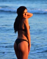 Brunette Marley is at the sea in tiger bikini walking topless with puffy nipples