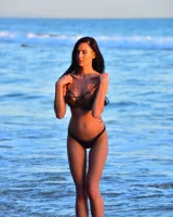 Brunette Marley is at the sea in tiger bikini walking topless with puffy nipples