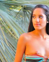 Michele is in the garden in motley bikini and nude