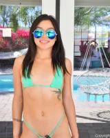 Green micro bikini latin brunette Micki has puffy nipples at poolside