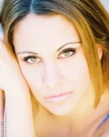 Glamour babe Nikki flashes her cameltoe in sexy lingerie by the pool