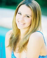 Glamour babe Nikki flashes her cameltoe in sexy lingerie by the pool