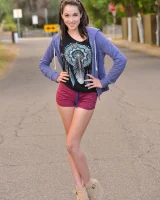 Skinny amateur teen Rachel slowly takes off her clothes and poses in public