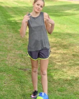 Athletic blonde babe enjoys pleasuring her bald pussy with sex toys