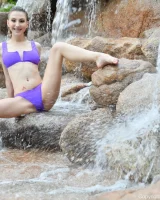 Long-legged amateur babe Tristan poses, strips and masturbates outdoors