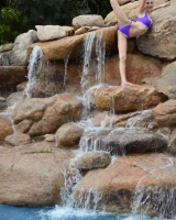 Long-legged amateur babe Tristan poses, strips and masturbates outdoors