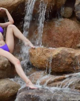 Long-legged amateur babe Tristan poses, strips and masturbates outdoors