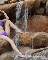 Long-legged amateur babe Tristan poses, strips and masturbates outdoors