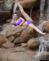 Long-legged amateur babe Tristan poses, strips and masturbates outdoors