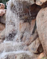 Long-legged amateur babe Tristan poses, strips and masturbates outdoors