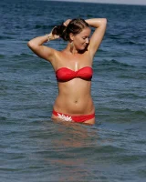 Busty Kendra in the sea in red bikini