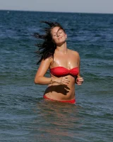 Busty Kendra in the sea in red bikini