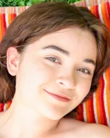 Lily Summers get wet in the garden in sexy bikini and nude showing her hairy vagina and puffy nipples