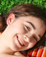 Lily Summers get wet in the garden in sexy bikini and nude showing her hairy vagina and puffy nipples